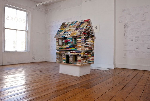 James P. Kinsella, Socialmaterialbank, 2010, books, cement, paper, wood, 800 x 533 cm